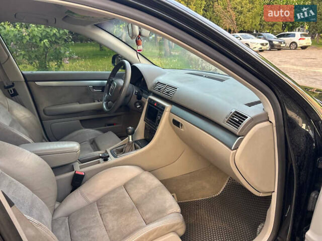 Чорний Ауді А4, об'ємом двигуна 2 л та пробігом 395 тис. км за 5950 $, фото 41 на Automoto.ua