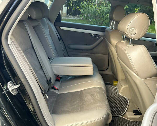 Чорний Ауді А4, об'ємом двигуна 2 л та пробігом 395 тис. км за 5950 $, фото 36 на Automoto.ua