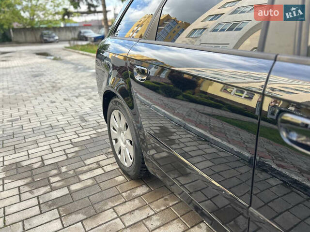 Чорний Ауді А4, об'ємом двигуна 2 л та пробігом 395 тис. км за 5950 $, фото 11 на Automoto.ua