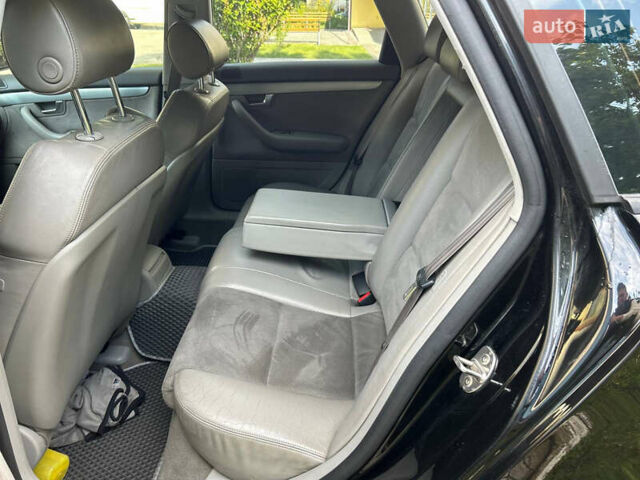 Чорний Ауді А4, об'ємом двигуна 2 л та пробігом 395 тис. км за 5950 $, фото 31 на Automoto.ua