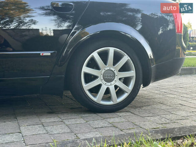 Черный Ауди А4, объемом двигателя 1.8 л и пробегом 224 тыс. км за 5950 $, фото 25 на Automoto.ua