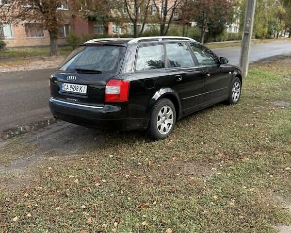 Черный Ауди А4, объемом двигателя 1.6 л и пробегом 200 тыс. км за 5600 $, фото 1 на Automoto.ua