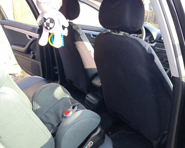 Черный Ауди А4, объемом двигателя 1.9 л и пробегом 314 тыс. км за 6700 $, фото 6 на Automoto.ua