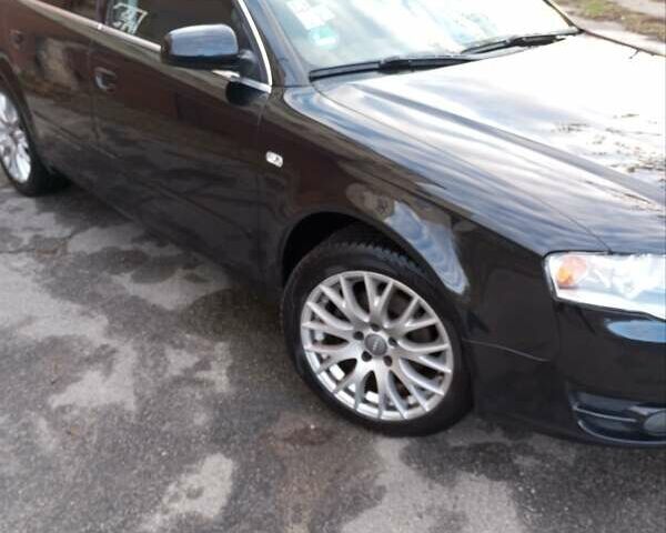 Черный Ауди А4, объемом двигателя 2 л и пробегом 195 тыс. км за 7799 $, фото 2 на Automoto.ua