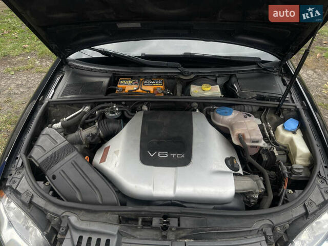 Черный Ауди А4, объемом двигателя 2.5 л и пробегом 430 тыс. км за 7400 $, фото 7 на Automoto.ua