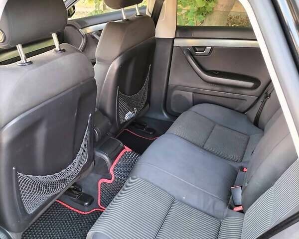 Чорний Ауді А4, об'ємом двигуна 2 л та пробігом 260 тис. км за 6100 $, фото 1 на Automoto.ua