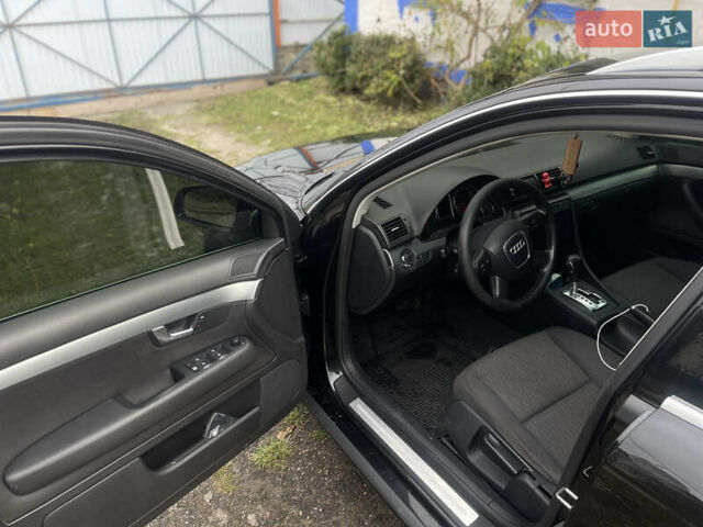 Черный Ауди А4, объемом двигателя 2.5 л и пробегом 430 тыс. км за 7400 $, фото 4 на Automoto.ua