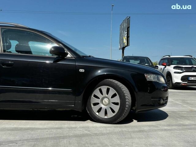 Черный Ауди А4, объемом двигателя 2 л и пробегом 318 тыс. км за 6940 $, фото 10 на Automoto.ua