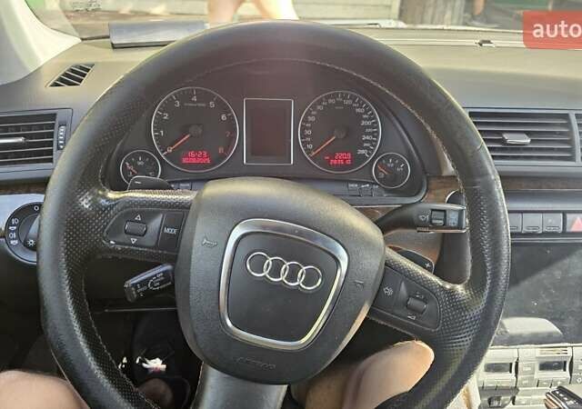 Черный Ауди А4, объемом двигателя 1.98 л и пробегом 283 тыс. км за 7500 $, фото 5 на Automoto.ua