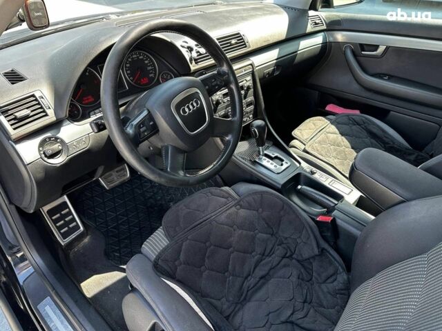 Черный Ауди А4, объемом двигателя 2 л и пробегом 318 тыс. км за 6940 $, фото 13 на Automoto.ua