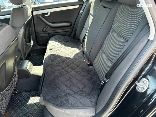 Черный Ауди А4, объемом двигателя 2 л и пробегом 318 тыс. км за 6940 $, фото 23 на Automoto.ua