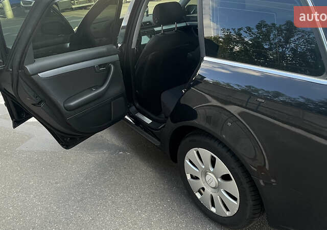 Черный Ауди А4, объемом двигателя 2 л и пробегом 312 тыс. км за 6500 $, фото 18 на Automoto.ua