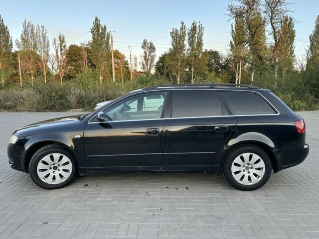 Черный Ауди А4, объемом двигателя 2 л и пробегом 321 тыс. км за 3100 $, фото 1 на Automoto.ua