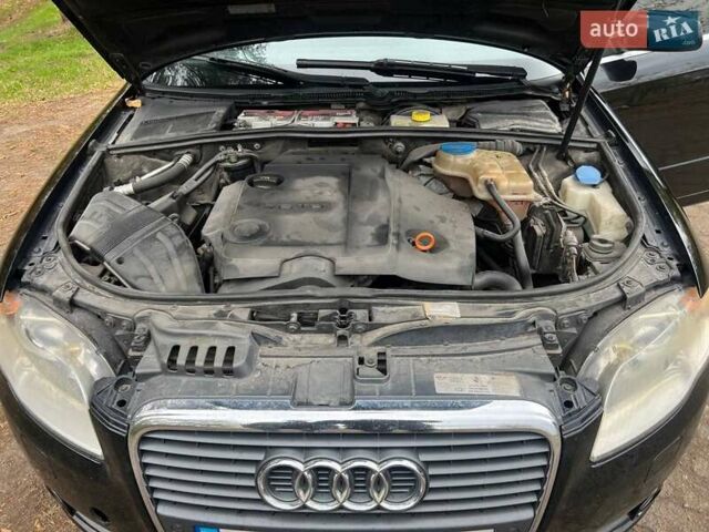 Черный Ауди А4, объемом двигателя 2 л и пробегом 220 тыс. км за 5999 $, фото 7 на Automoto.ua