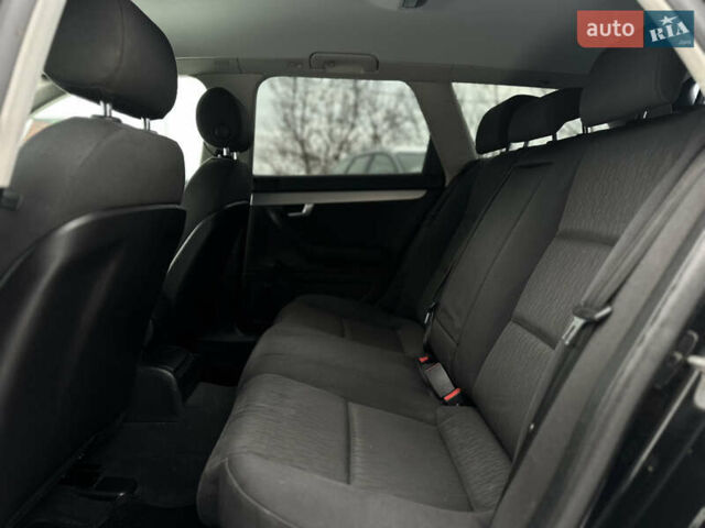 Чорний Ауді А4, об'ємом двигуна 2 л та пробігом 241 тис. км за 7200 $, фото 32 на Automoto.ua