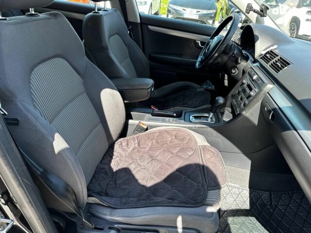 Черный Ауди А4, объемом двигателя 2 л и пробегом 318 тыс. км за 6940 $, фото 28 на Automoto.ua