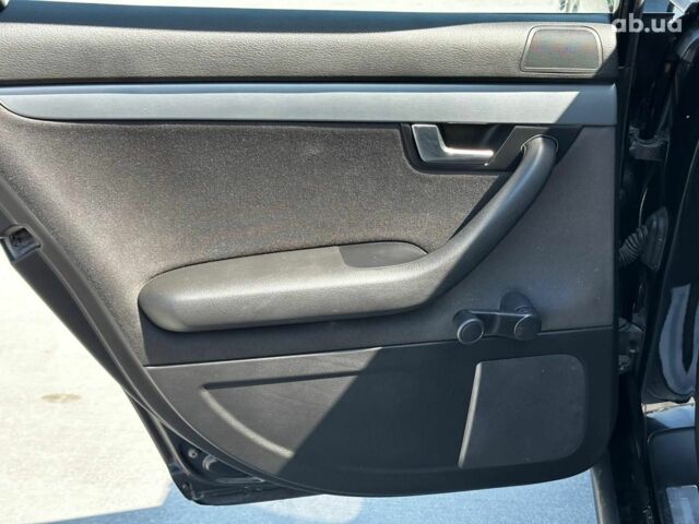 Черный Ауди А4, объемом двигателя 2 л и пробегом 318 тыс. км за 6940 $, фото 22 на Automoto.ua