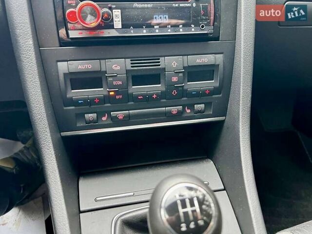 Чорний Ауді А4, об'ємом двигуна 1.8 л та пробігом 218 тис. км за 7650 $, фото 89 на Automoto.ua