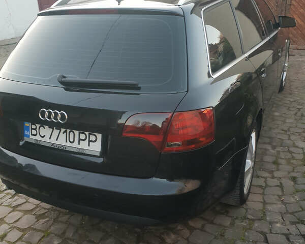 Черный Ауди А4, объемом двигателя 2 л и пробегом 390 тыс. км за 5900 $, фото 1 на Automoto.ua