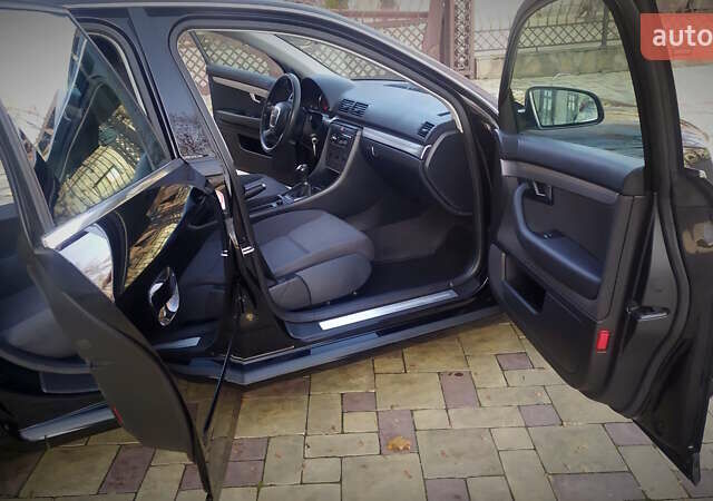 Черный Ауди А4, объемом двигателя 1.6 л и пробегом 200 тыс. км за 7400 $, фото 120 на Automoto.ua