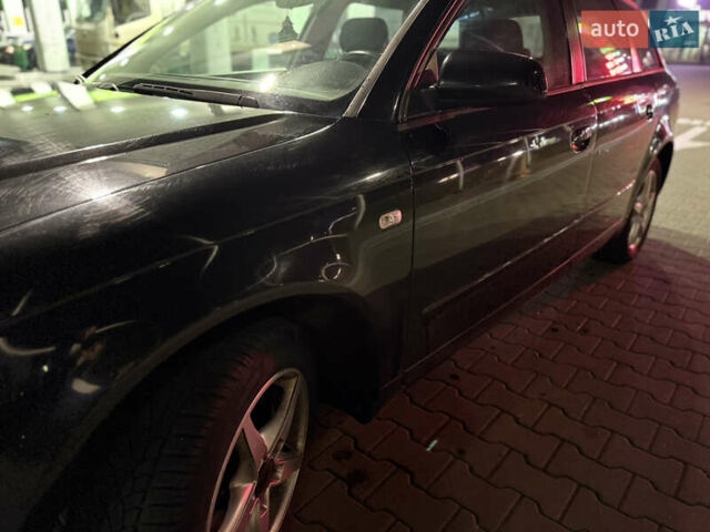 Черный Ауди А4, объемом двигателя 2 л и пробегом 300 тыс. км за 2950 $, фото 14 на Automoto.ua