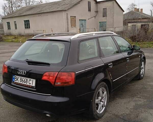 Черный Ауди А4, объемом двигателя 2 л и пробегом 266 тыс. км за 7000 $, фото 13 на Automoto.ua