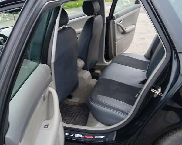 Черный Ауди А4, объемом двигателя 2 л и пробегом 266 тыс. км за 7000 $, фото 9 на Automoto.ua