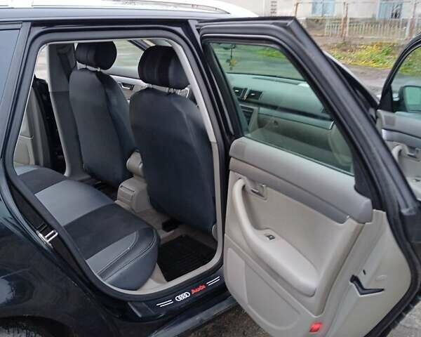 Черный Ауди А4, объемом двигателя 2 л и пробегом 266 тыс. км за 7000 $, фото 6 на Automoto.ua