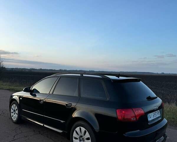 Черный Ауди А4, объемом двигателя 1.97 л и пробегом 313 тыс. км за 6200 $, фото 5 на Automoto.ua