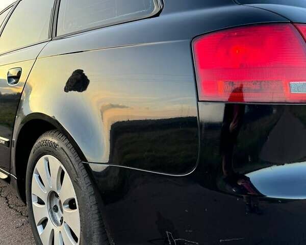 Черный Ауди А4, объемом двигателя 1.97 л и пробегом 313 тыс. км за 6200 $, фото 2 на Automoto.ua