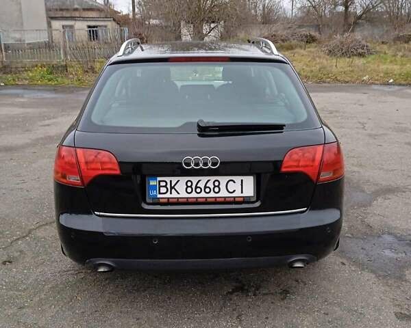 Черный Ауди А4, объемом двигателя 2 л и пробегом 266 тыс. км за 7000 $, фото 1 на Automoto.ua