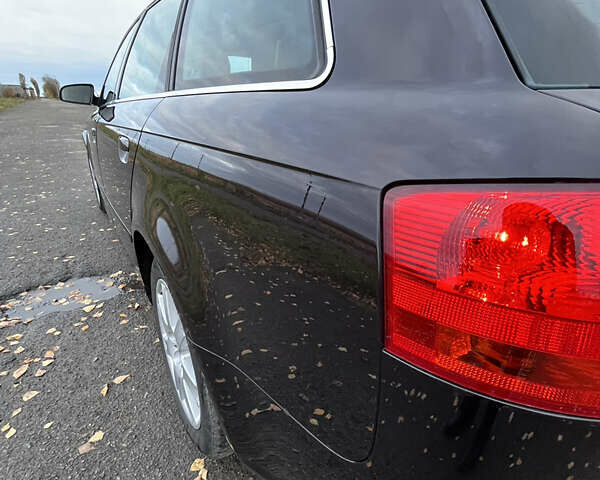 Чорний Ауді А4, об'ємом двигуна 1.8 л та пробігом 299 тис. км за 7599 $, фото 23 на Automoto.ua