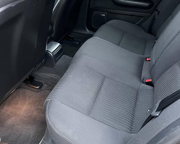 Чорний Ауді А4, об'ємом двигуна 1.8 л та пробігом 299 тис. км за 7599 $, фото 46 на Automoto.ua