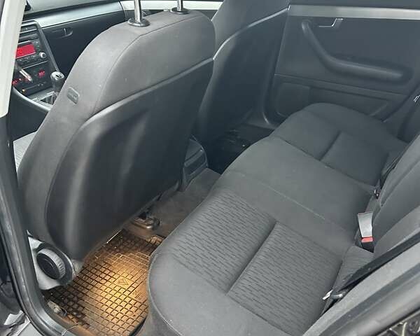 Черный Ауди А4, объемом двигателя 1.6 л и пробегом 197 тыс. км за 6950 $, фото 9 на Automoto.ua