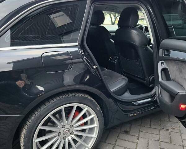 Черный Ауди А4, объемом двигателя 2 л и пробегом 178 тыс. км за 11499 $, фото 66 на Automoto.ua