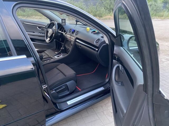 Черный Ауди А4, объемом двигателя 2 л и пробегом 330 тыс. км за 9000 $, фото 6 на Automoto.ua