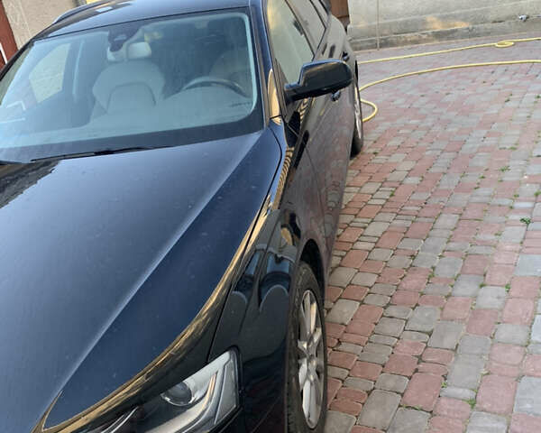 Ауді А4 2014 у Чорткові на Automoto.ua Чорний Ауді А4, об'ємом двигуна 2 л та пробігом 218 тис. км за 15500 $, фото 6 на Automoto.ua