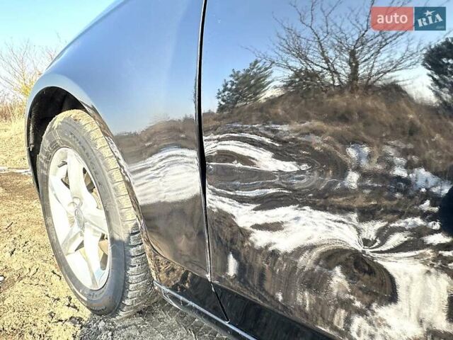 Ауді А4 2015 у Рівному на Automoto.ua Чорний Ауді А4, об'ємом двигуна 1.97 л та пробігом 262 тис. км за 11700 $, фото 6 на Automoto.ua