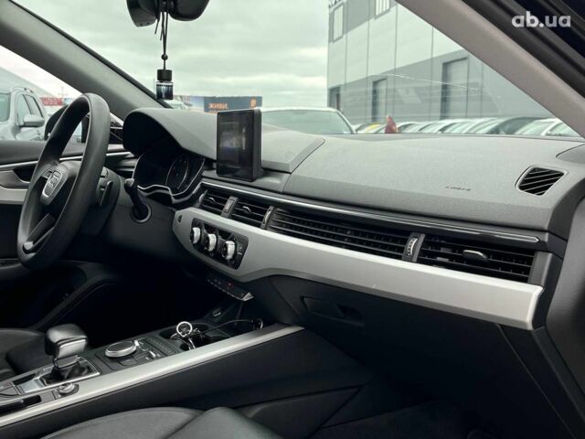 Чорний Ауді А4, об'ємом двигуна 2 л та пробігом 295 тис. км за 16290 $, фото 20 на Automoto.ua