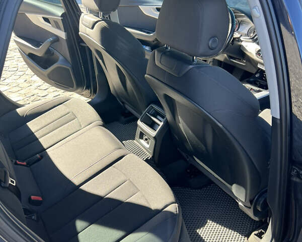 Черный Ауди А4, объемом двигателя 2 л и пробегом 318 тыс. км за 15999 $, фото 2 на Automoto.ua