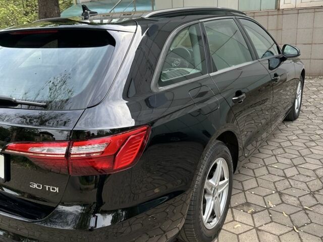 Черный Ауди А4, объемом двигателя 2 л и пробегом 60 тыс. км за 32400 $, фото 1 на Automoto.ua