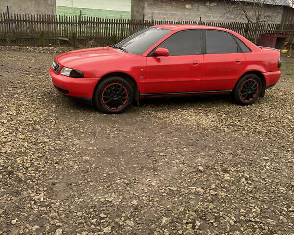 Красный Ауди А4, объемом двигателя 1.6 л и пробегом 300 тыс. км за 2999 $, фото 3 на Automoto.ua