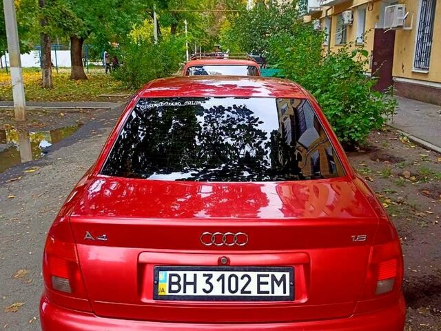 Красный Ауди А4, объемом двигателя 1.8 л и пробегом 128 тыс. км за 3300 $, фото 1 на Automoto.ua