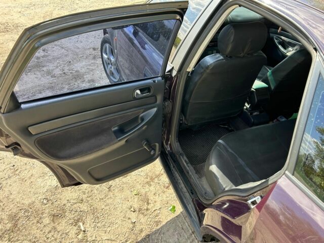 Красный Ауди А4, объемом двигателя 1.9 л и пробегом 500 тыс. км за 2300 $, фото 4 на Automoto.ua