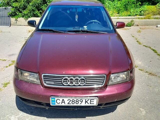 Красный Ауди А4, объемом двигателя 2.8 л и пробегом 387 тыс. км за 3800 $, фото 1 на Automoto.ua