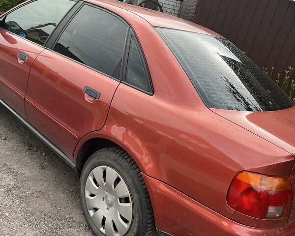 Красный Ауди А4, объемом двигателя 1.6 л и пробегом 200 тыс. км за 5100 $, фото 3 на Automoto.ua
