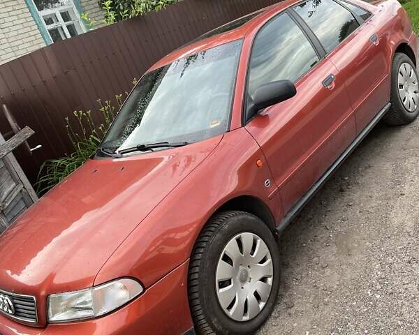 Красный Ауди А4, объемом двигателя 1.6 л и пробегом 200 тыс. км за 5100 $, фото 2 на Automoto.ua