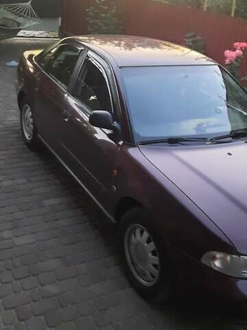 Красный Ауди А4, объемом двигателя 1.8 л и пробегом 255 тыс. км за 3500 $, фото 2 на Automoto.ua