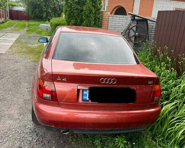 Красный Ауди А4, объемом двигателя 1.6 л и пробегом 200 тыс. км за 5100 $, фото 4 на Automoto.ua