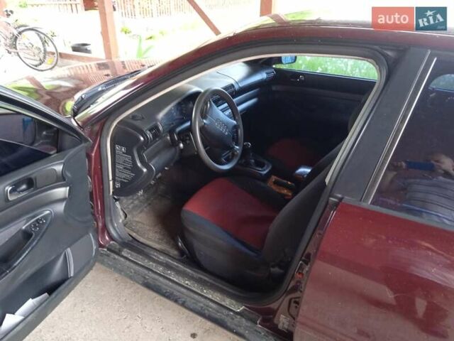 Красный Ауди А4, объемом двигателя 1.6 л и пробегом 354 тыс. км за 3500 $, фото 3 на Automoto.ua